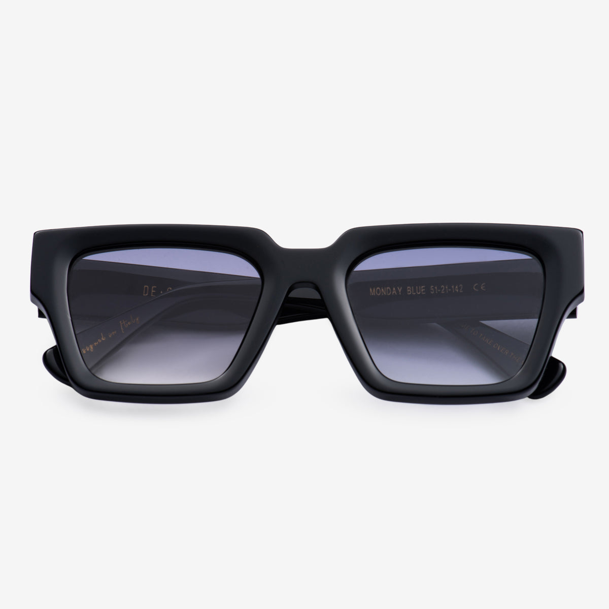 a pair of black scissors sitting on top of a table