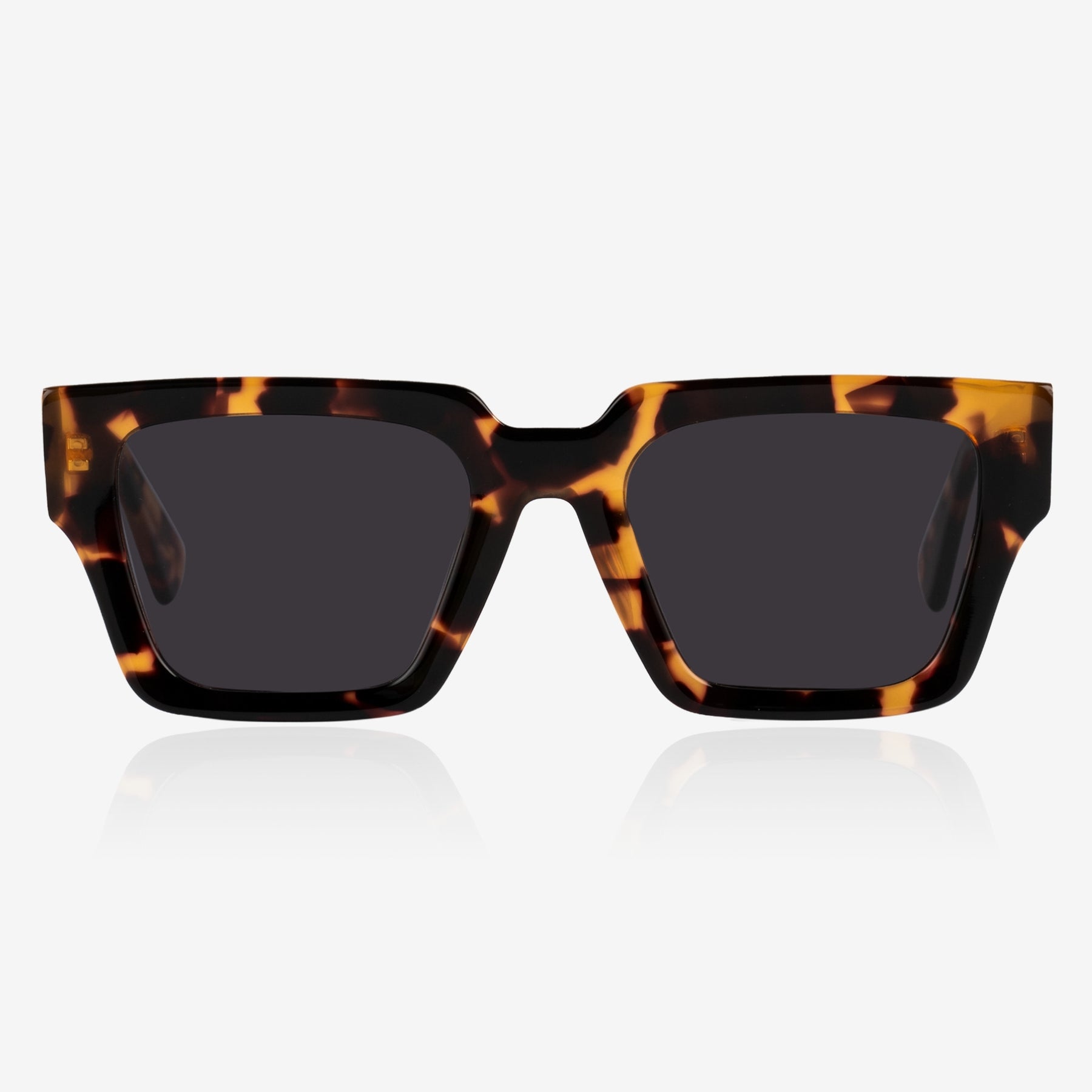 a pair of glasses sitting on top of a table 