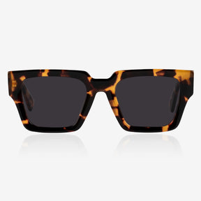 a pair of glasses sitting on top of a table 