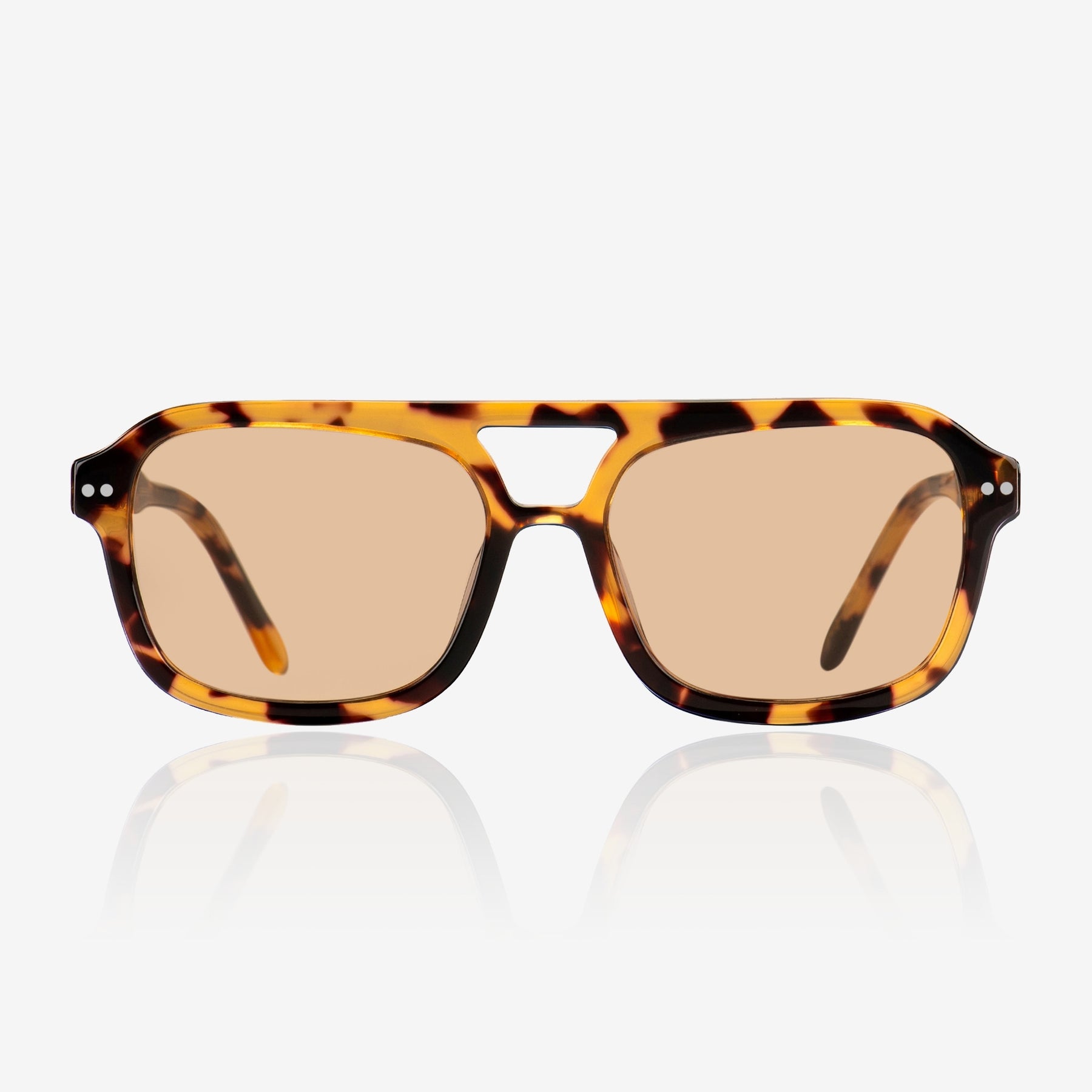 a pair of glasses sitting on top of a white table 