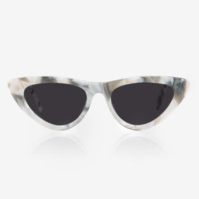 a pair of glasses sitting on top of a table 
