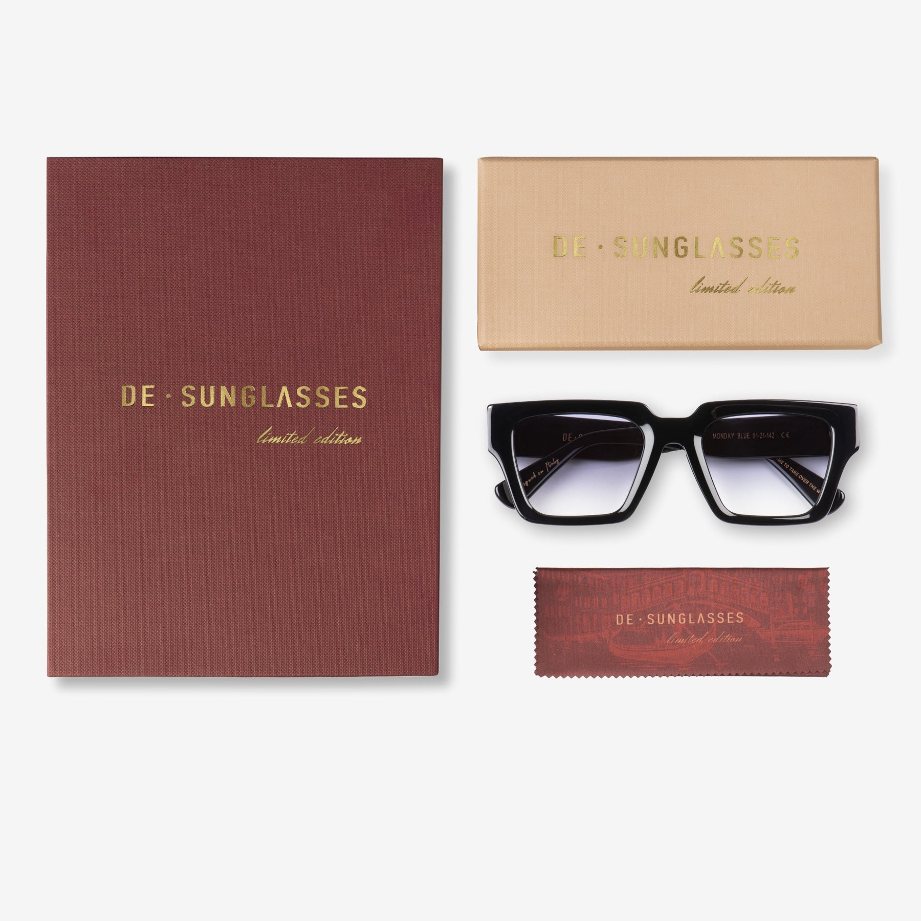 a pair of glasses sitting on top of a shelf 
