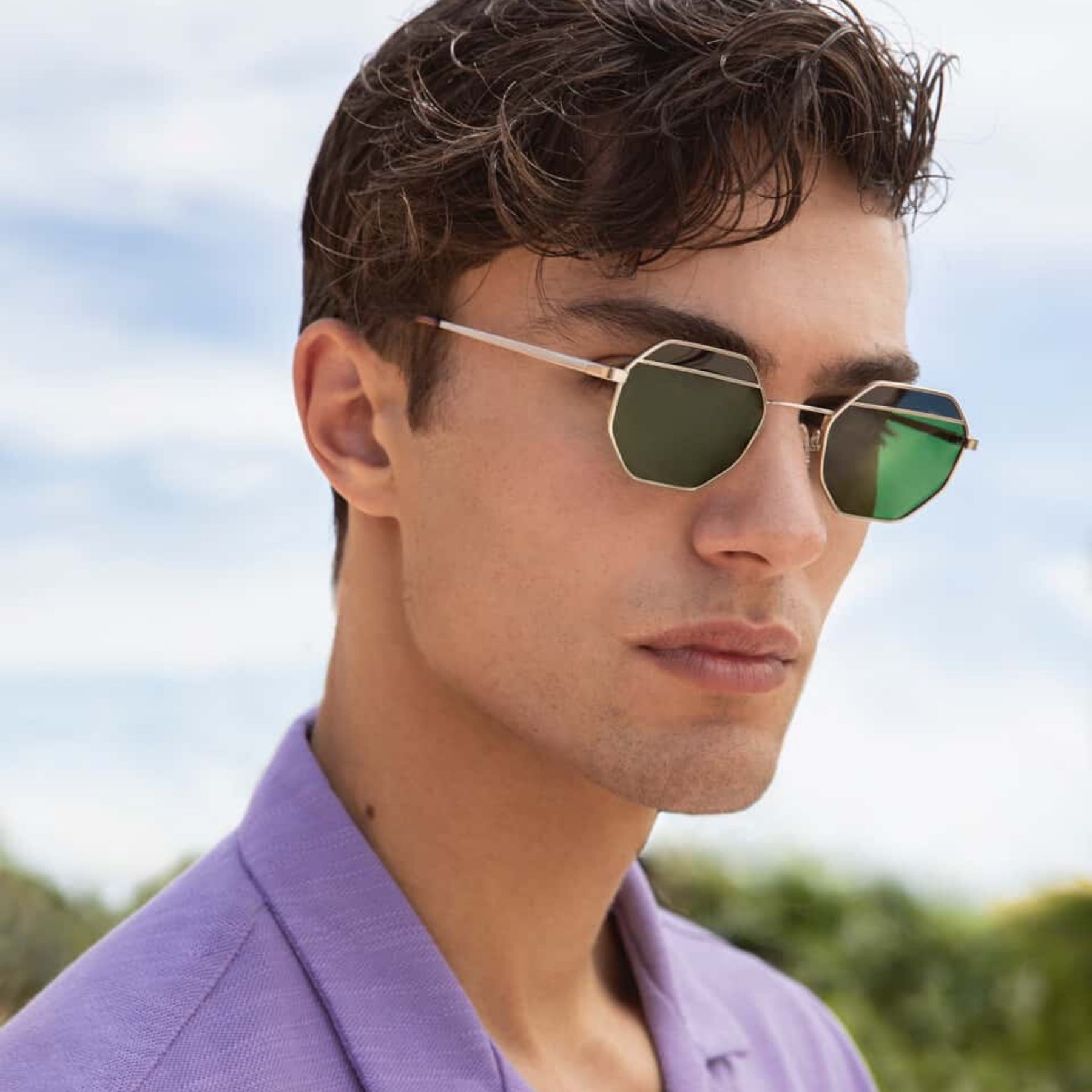 a close up of a person wearing sunglasses 