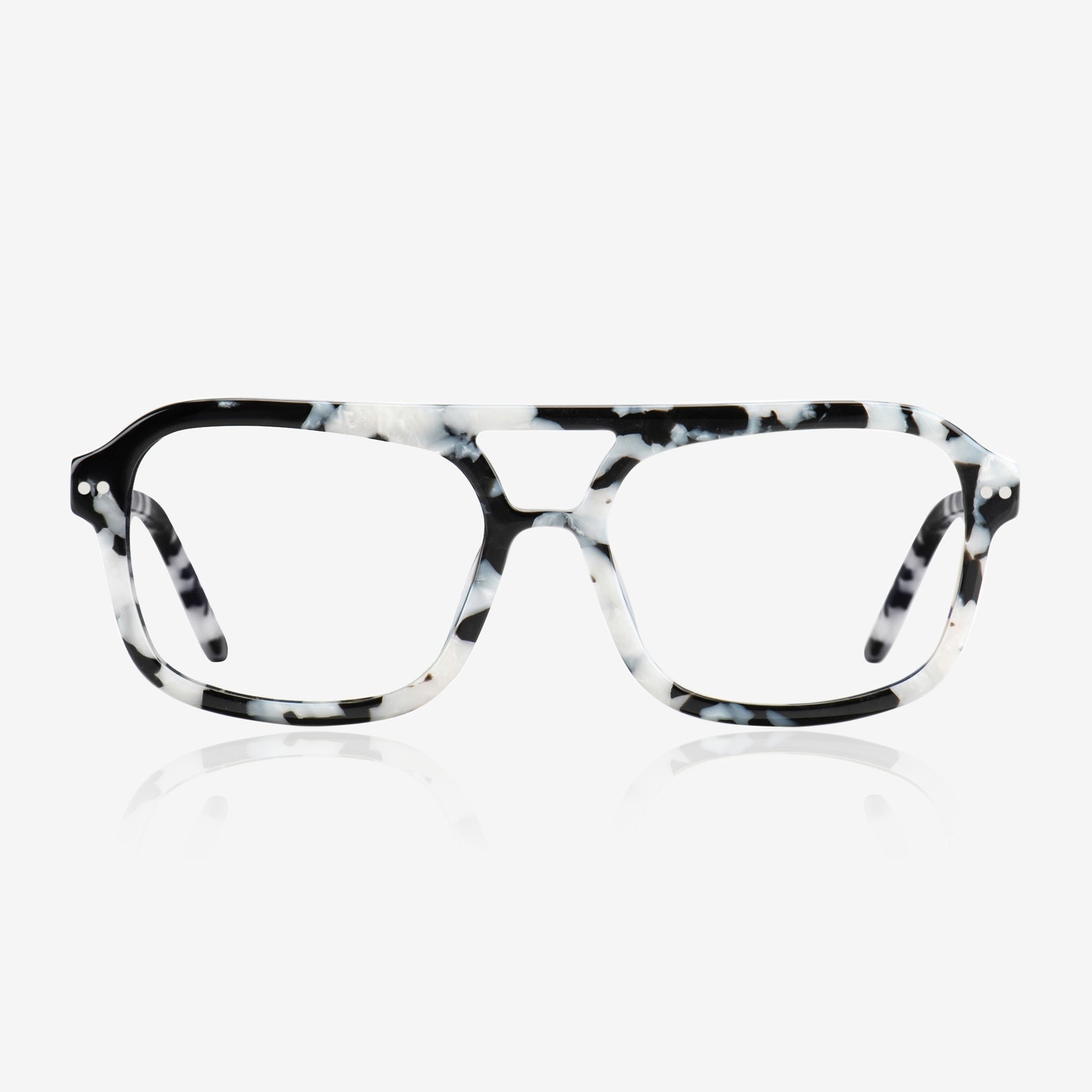 a pair of glasses sitting on top of a table 