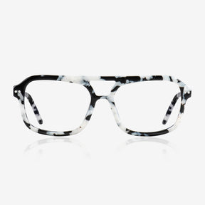a pair of glasses sitting on top of a table 