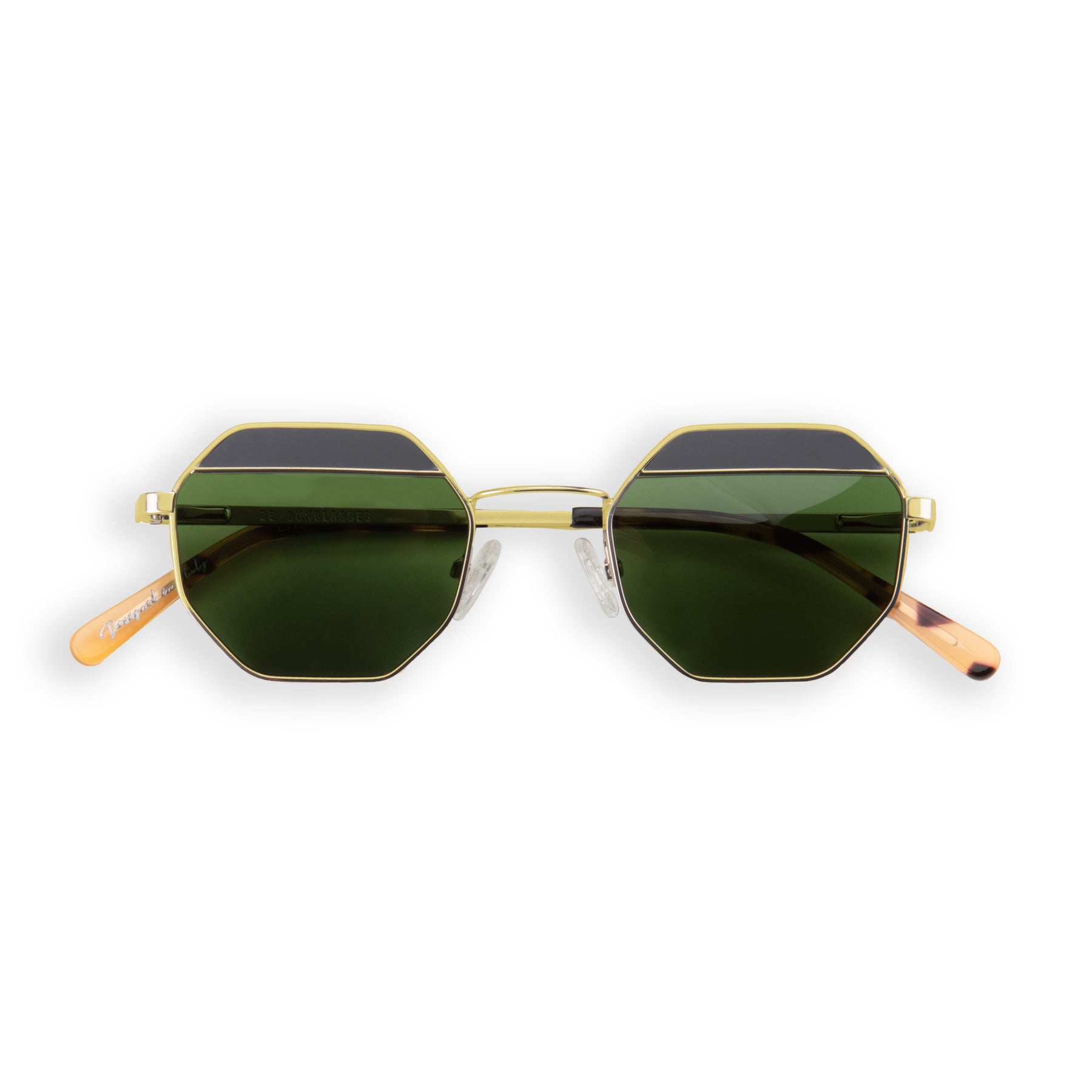 a pair of green glasses on a white surface 